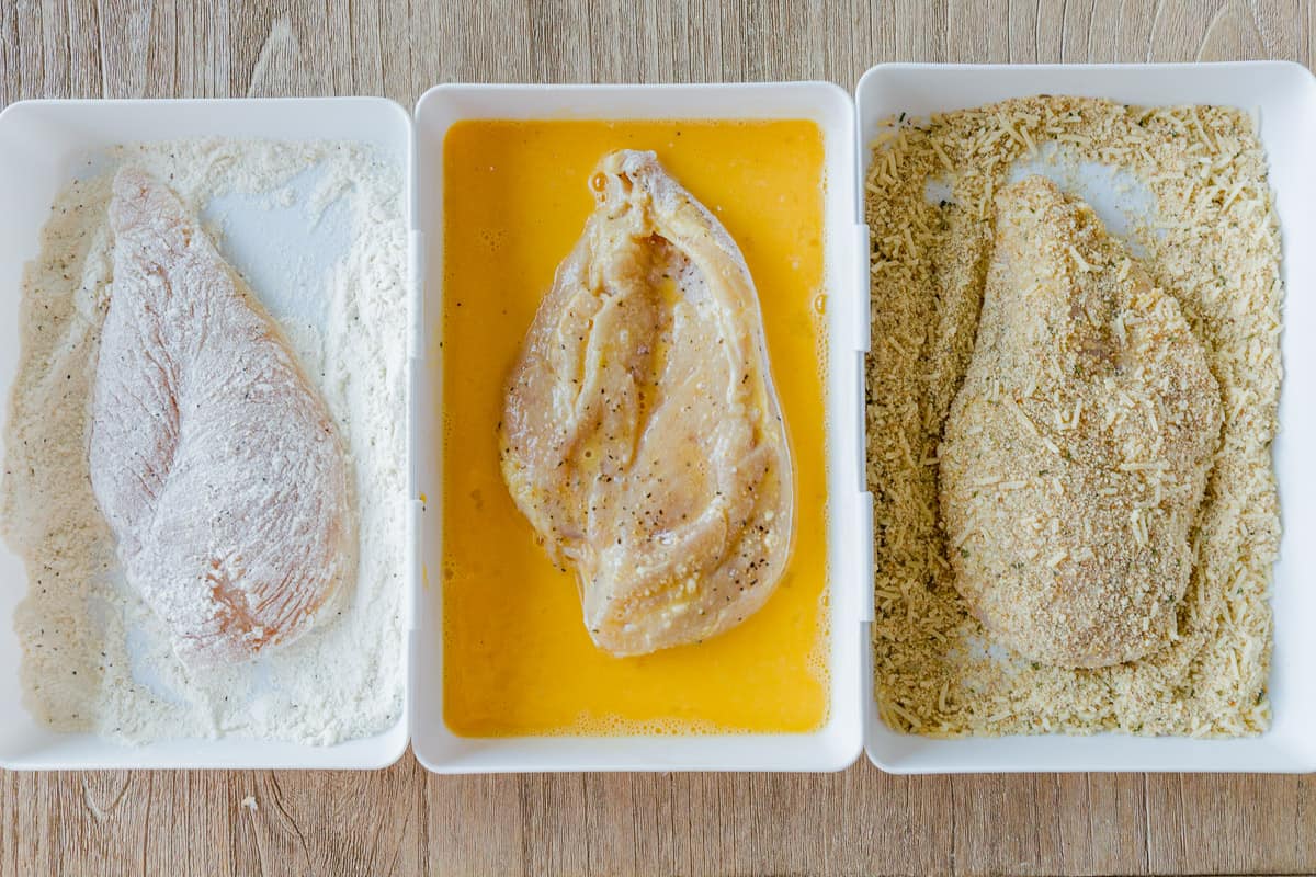 Chicken breading bowls with flour, egg and crumb mixture