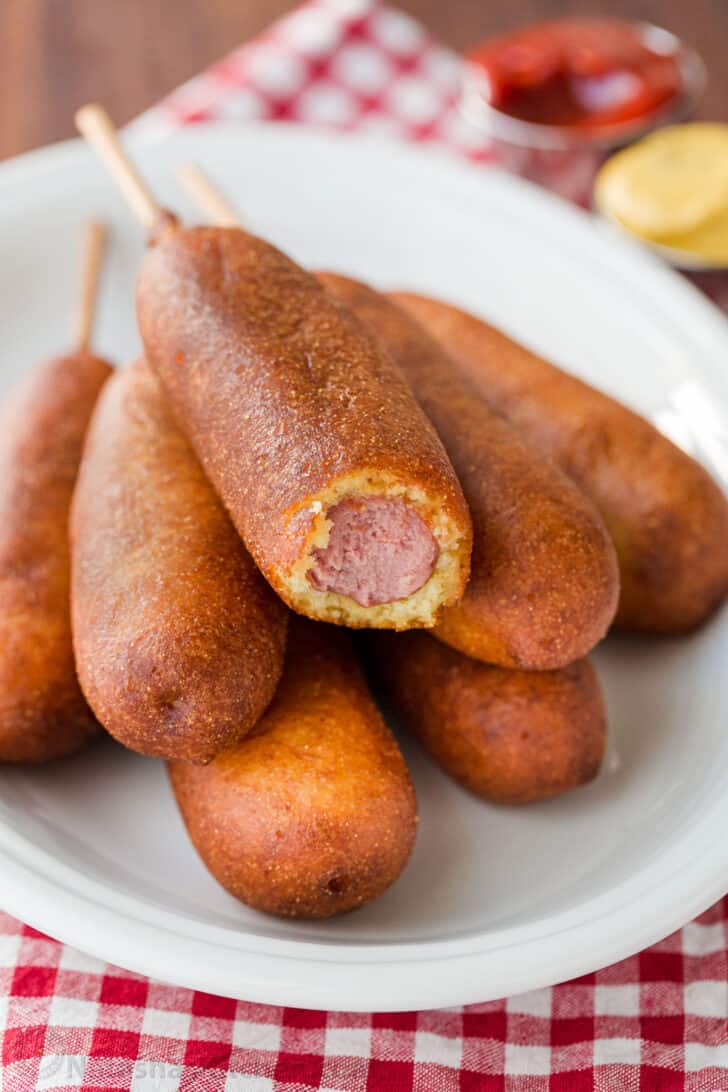 corn dogs on a platter served