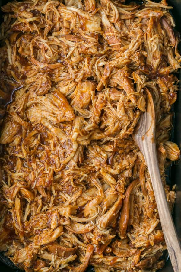 Crockpot BBQ Chicken - The Best Slow Cooker Pulled Chicken! Fall-apart tender, juicy and delicious! | natashaskitchen.com