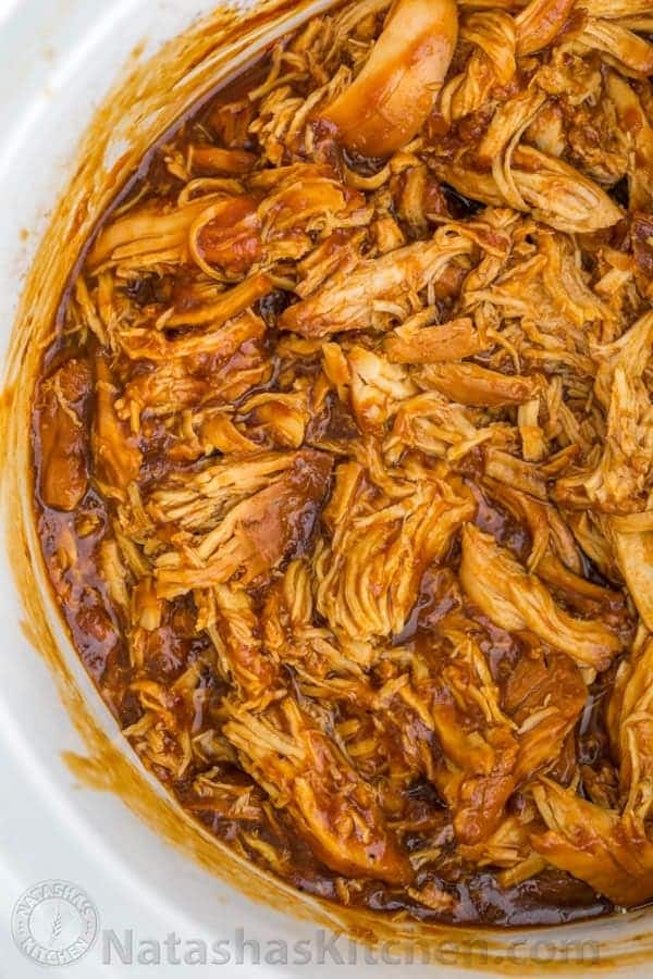 Crockpot BBQ Chicken - The Best Slow Cooker Pulled Chicken! Fall-apart tender, juicy and delicious! | natashaskitchen.com